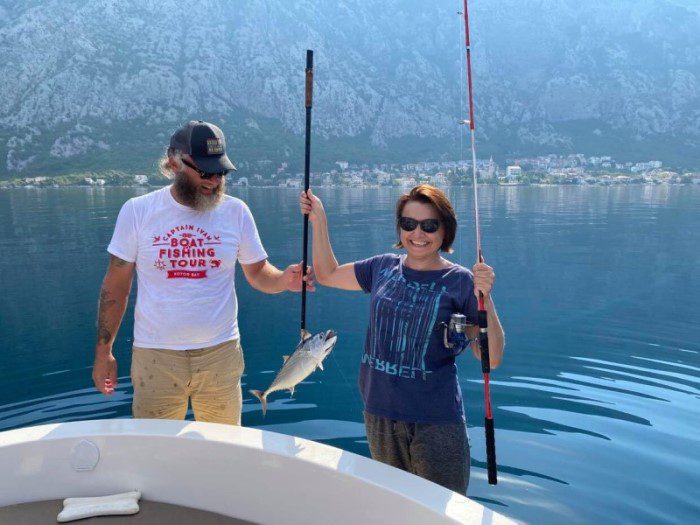 Kotor fishing - a happy guest with her catch