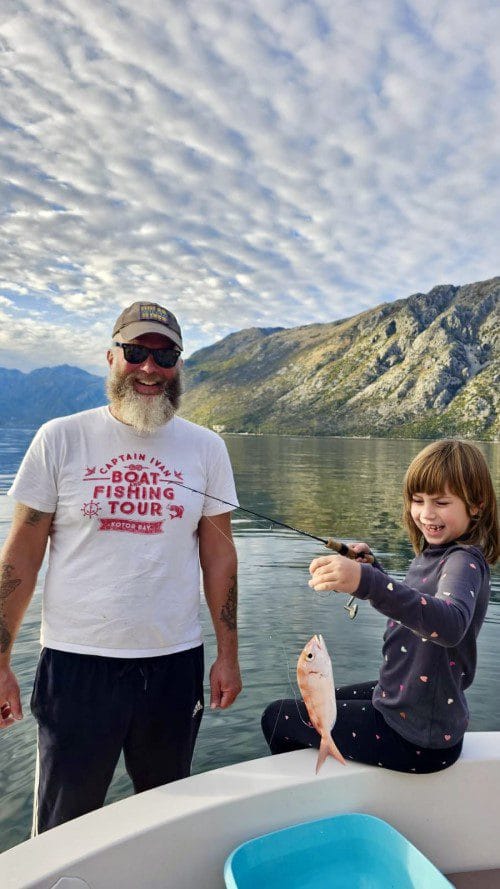 first-big-catch-snapper first big catch - ivan with his daughter holding a common pandora