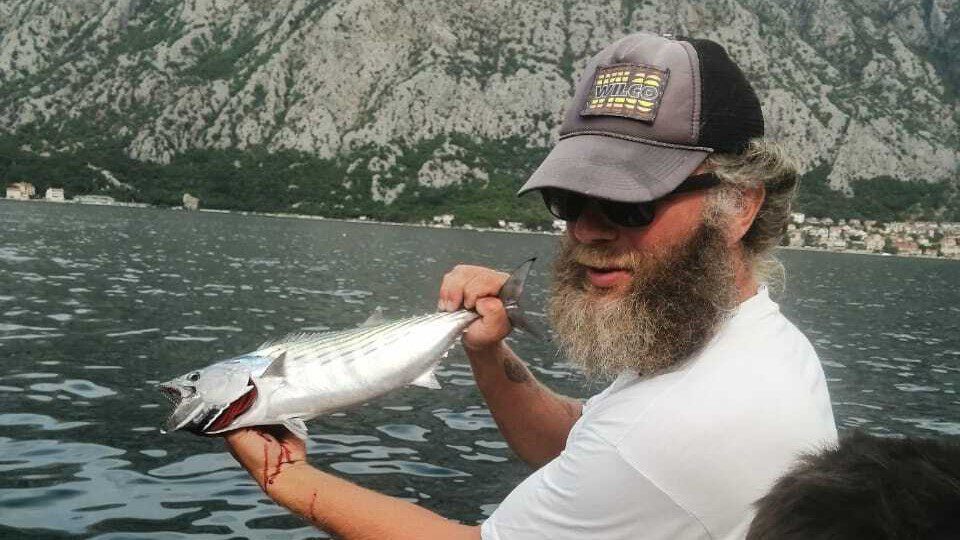 Mackerels and Bonitos in Kotor Bay - image of Ivan with a caught bonito - HERO image