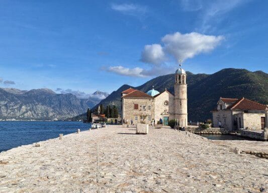 kotor boat tours - view of Our Lady of the Rocks church 